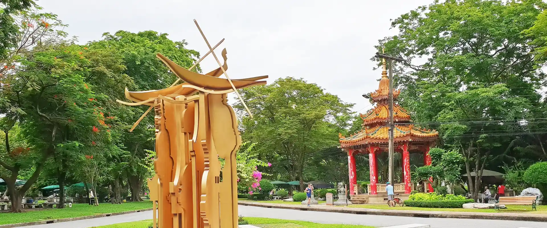 Alveo’s stylised boat forms in Lumphini Park, with the Chinese Pavilion behind.