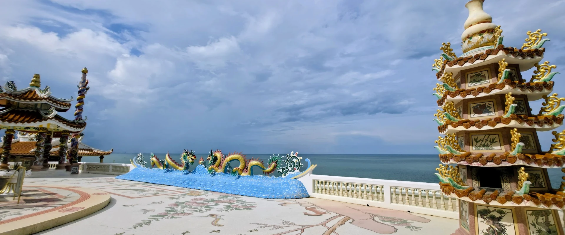 Decorated seaside terrace at the mapped Phra Mae Kwan Im Shrine on Khao Takiap
