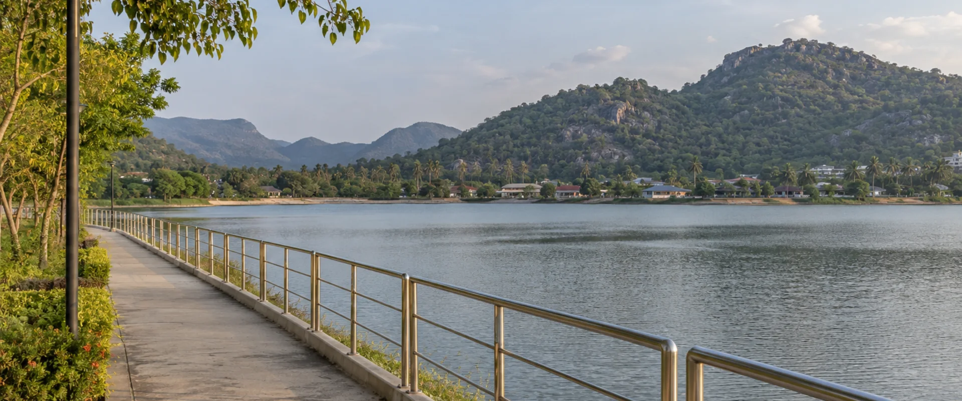 A paved reservoir path, simple railing and green hills in an AI-generated contextual scene
