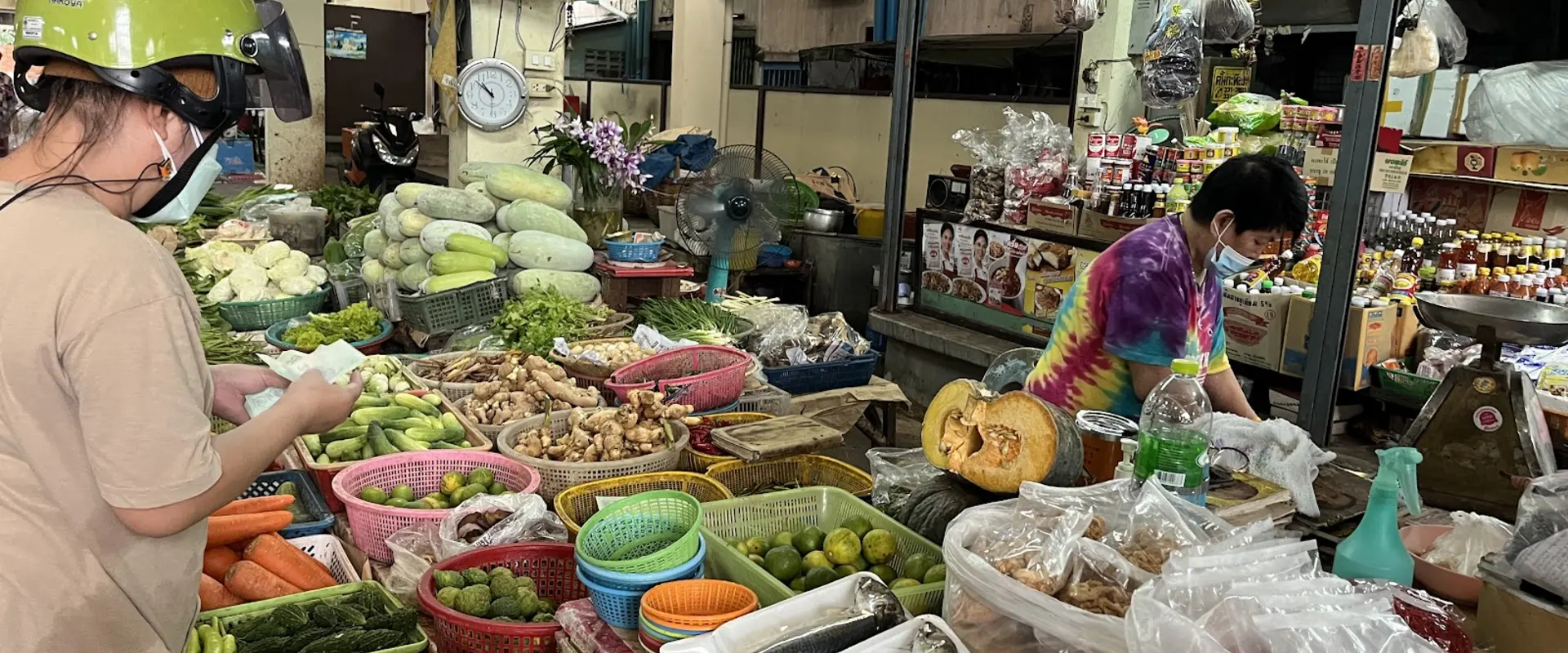 Vegetable and food-ingredient stall inside Charoensri Market in Phasi Charoen, Bangkok